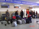 AT THE CHECK IN 019 * 448 x 336 * (27KB)